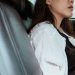 car cushion shown by lady sitting on seat